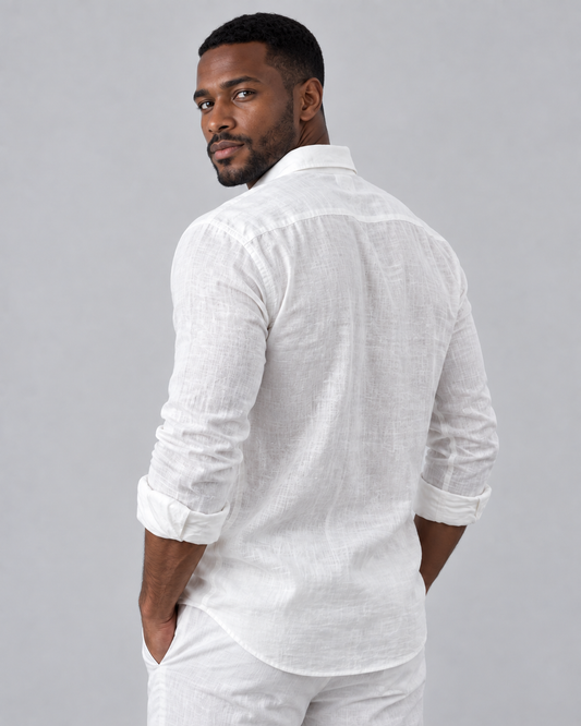 Man wearing a white linen shirt, back view